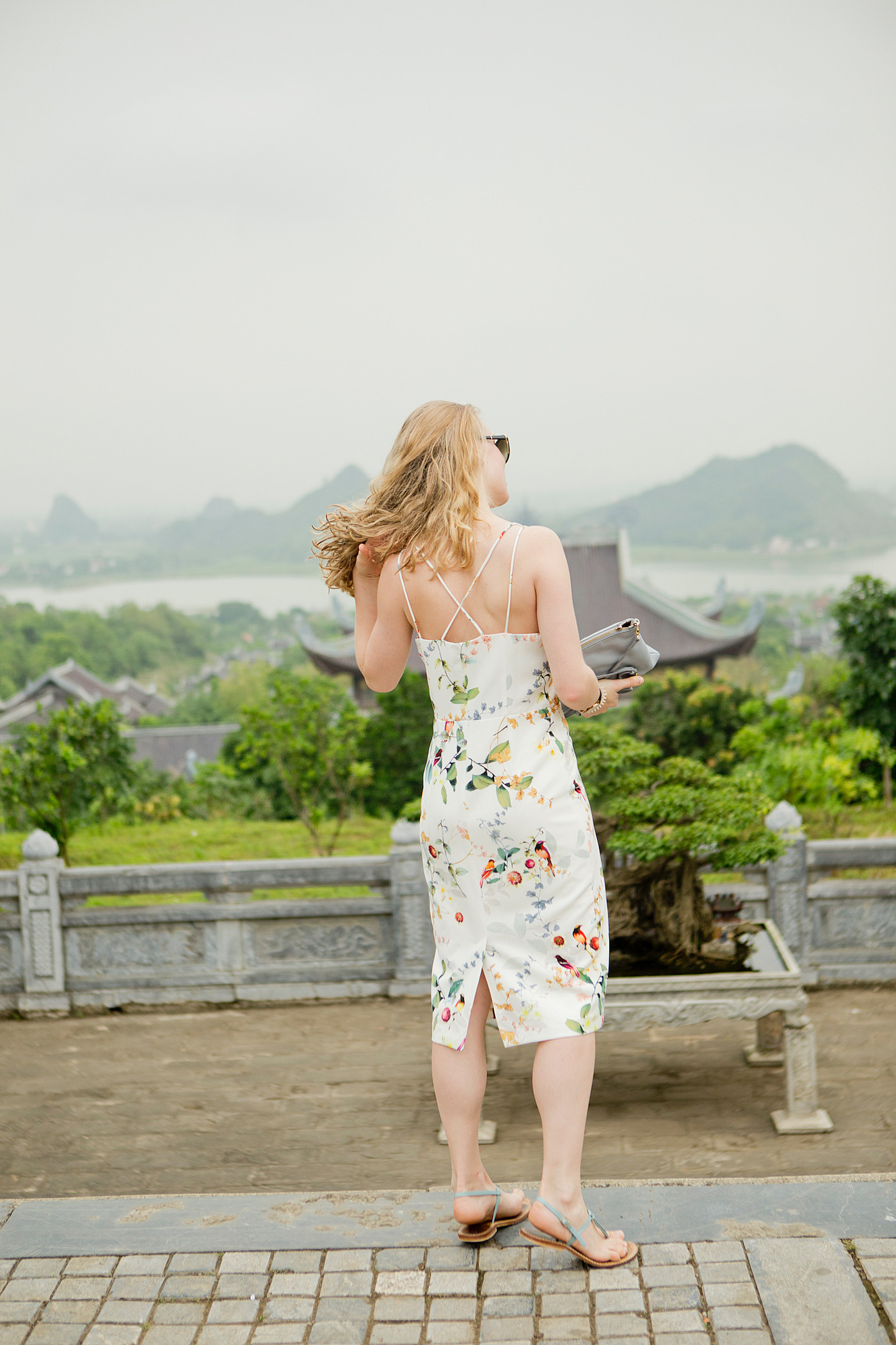 www.thegoldenbun.com | oasis floral dress, traveling outfit